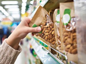 Shopper grabbing almond package